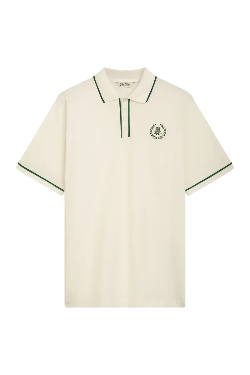 a LOTC LOTC POLOSHIRT WHITE / EVERGREEN UNFAIR ATHLETICS