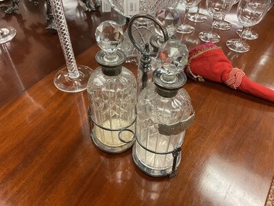 Set of Three Cut Glass Decanters with Silver Stand