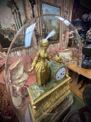 Pre-1840 Austrian Biedermeier Gilt Bronze Figural Clock of a Maiden Holding an Umbrella with a Garden Basket on top. Clock is on a Rosewood and Satinwood Inlaid Base Enclosed in an Original Glass Dome