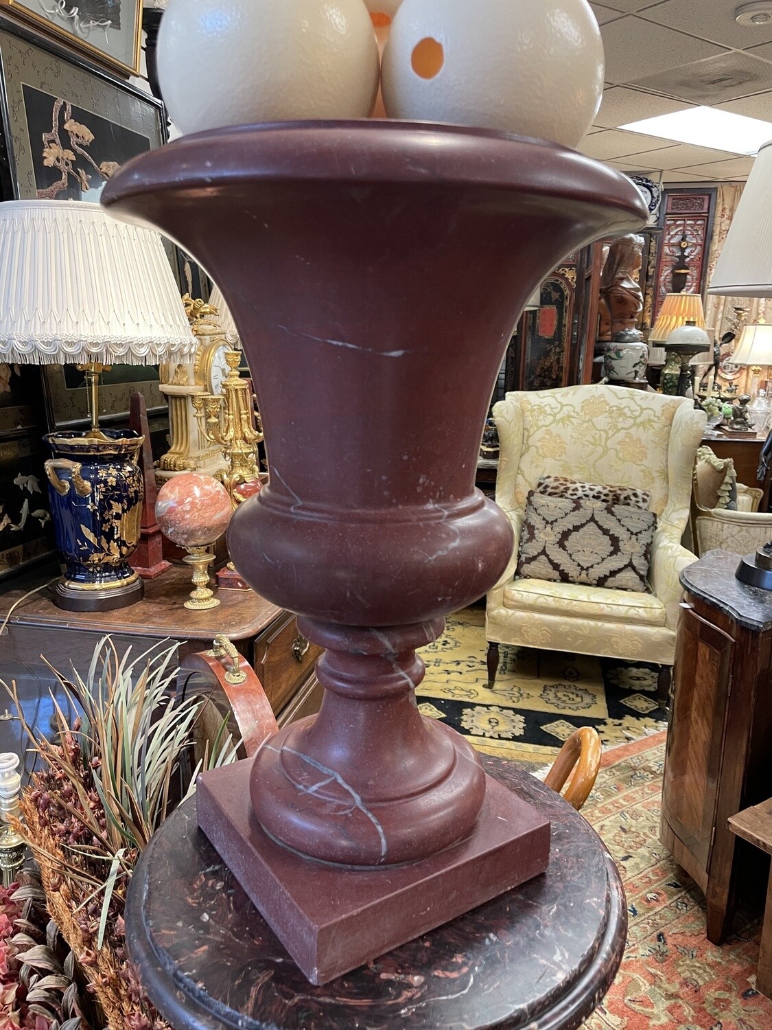 Pair of Large Red Rouge Royale Marble Urns. 20 inches tall, 13 inches wide, 8 inch base