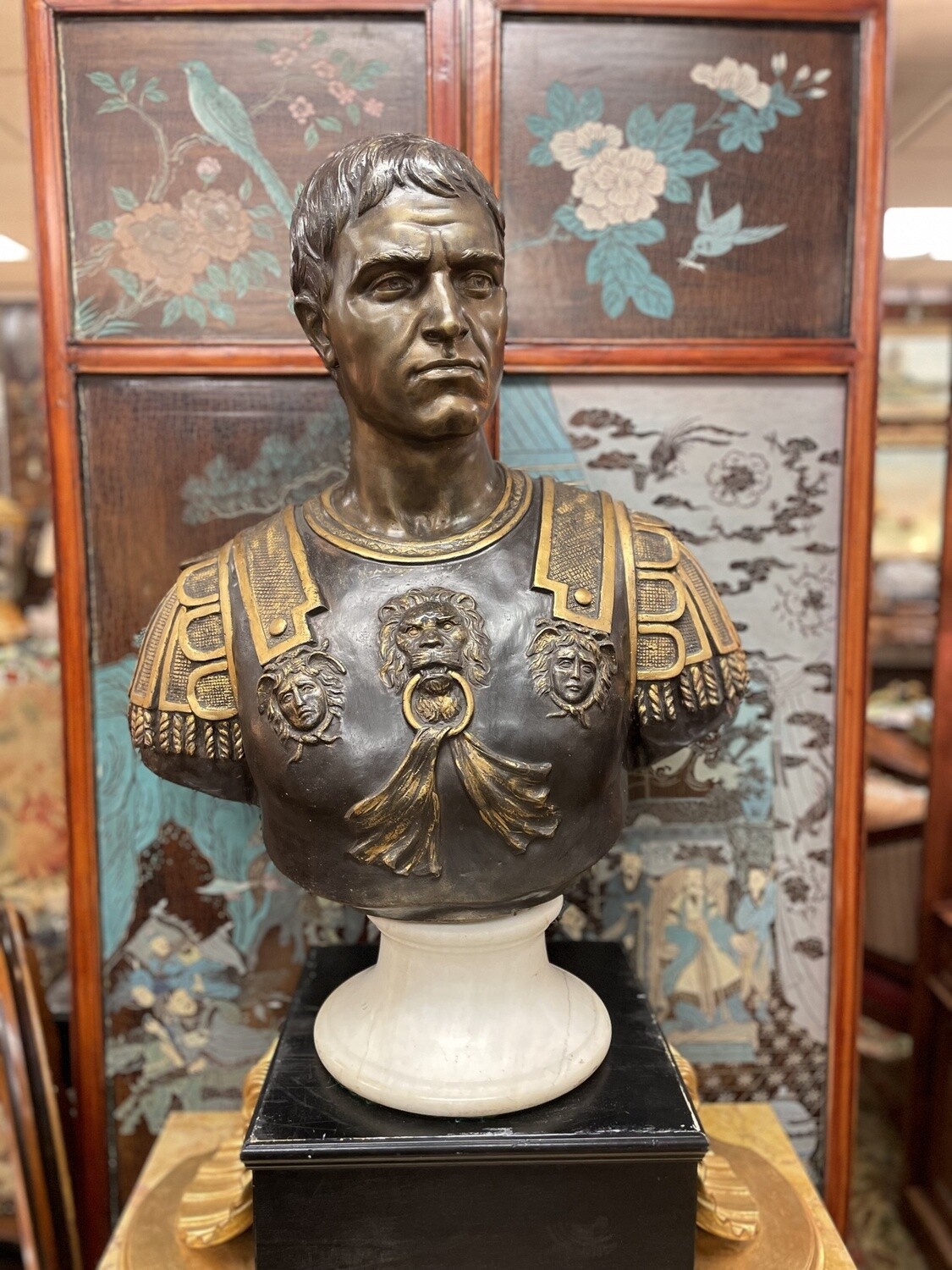 Larger than Life Bronze and Gilt Bust of Julius Cesar. 31 inches tall in total, 25 inches wide, on an 11 inch wide and 6 inch tall White Marble Base