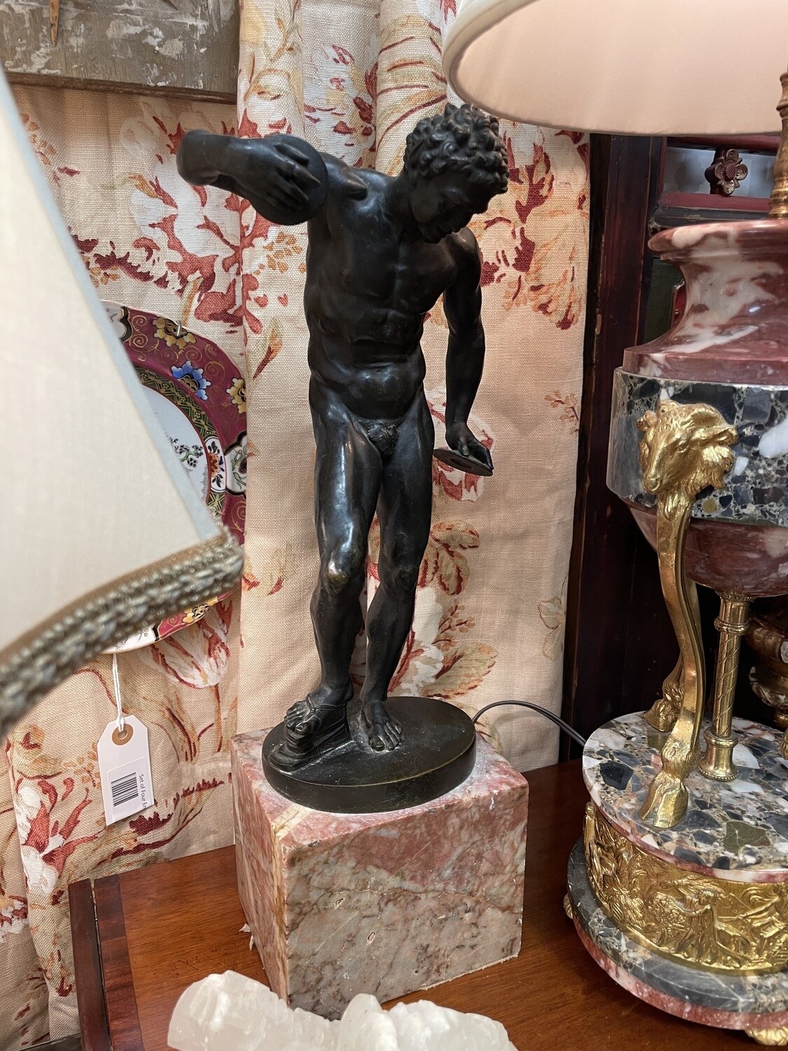Neoclassical Male Nude Bronze of Olympian Holding Discs on Pink Marble Base. 17.25 inches tall total, 4.5 inch Marble Base