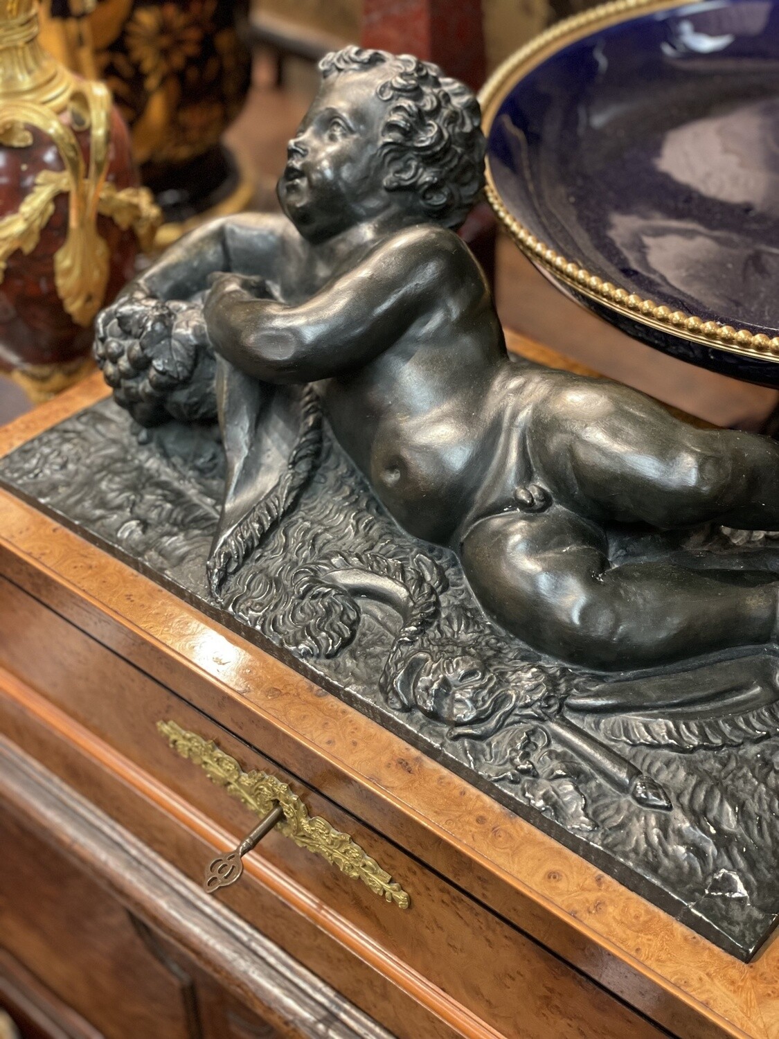 French Louis Philippe Burlwood Box with Plaster Sculpture of Cherub and Original Silk Lining