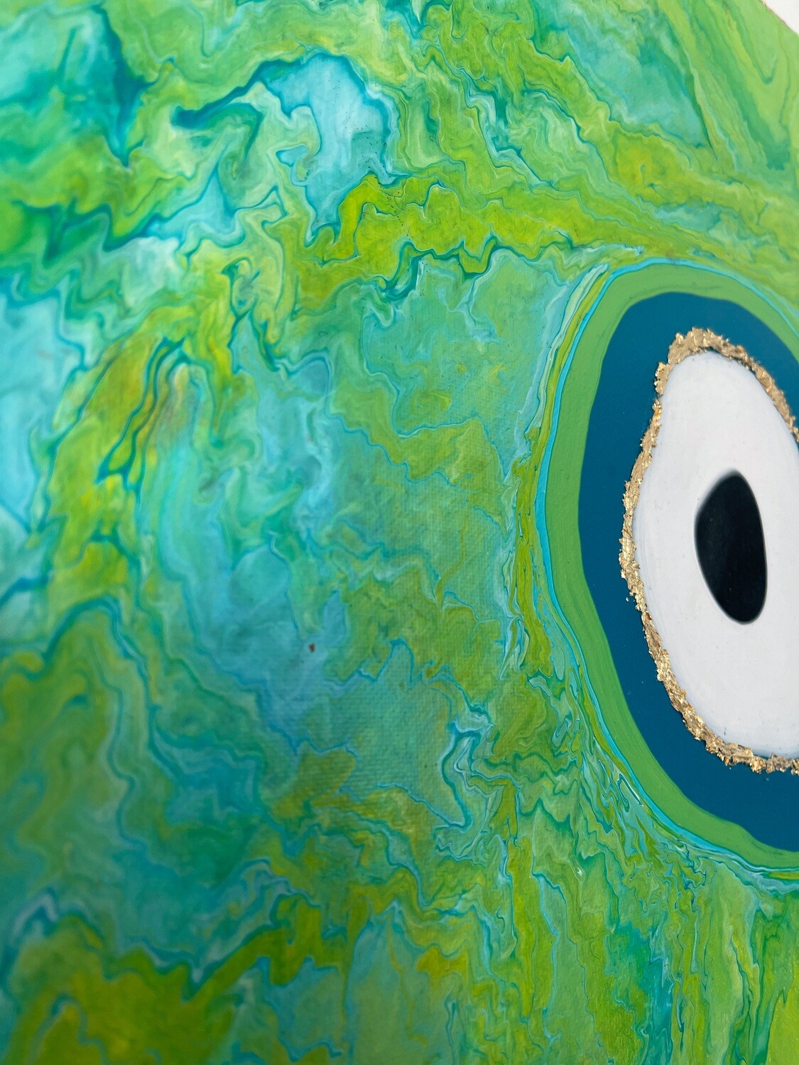 Gold Eye in Green Paradise