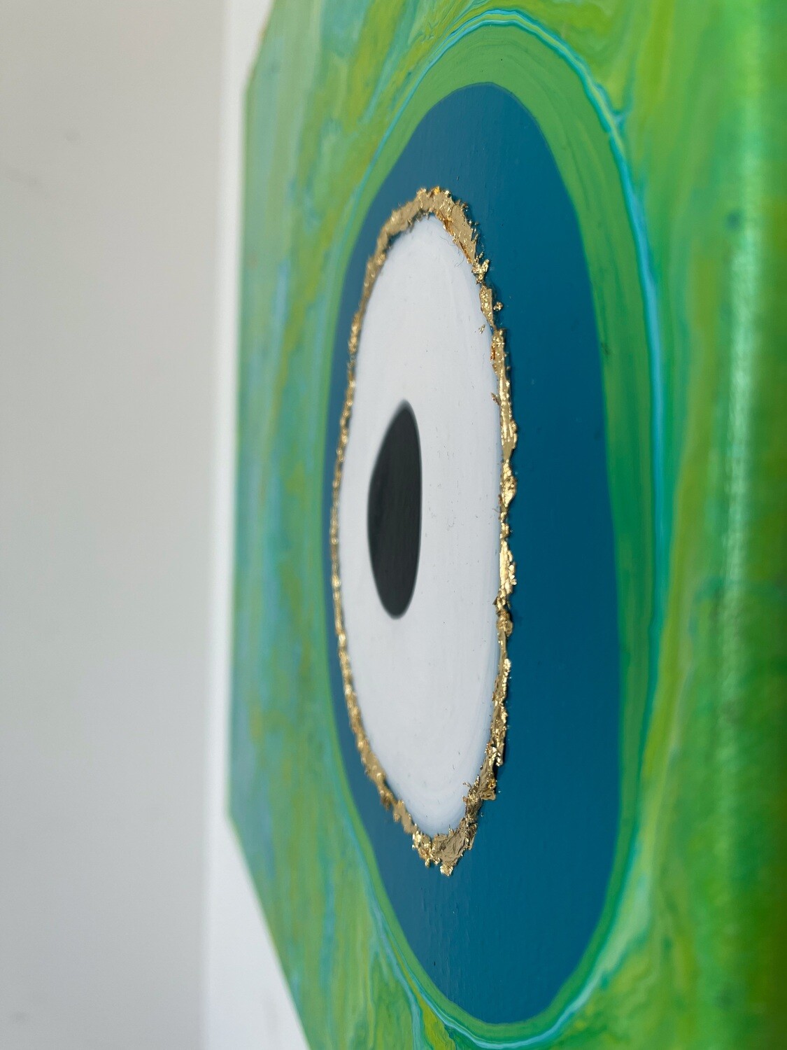 Gold Eye in Green Paradise