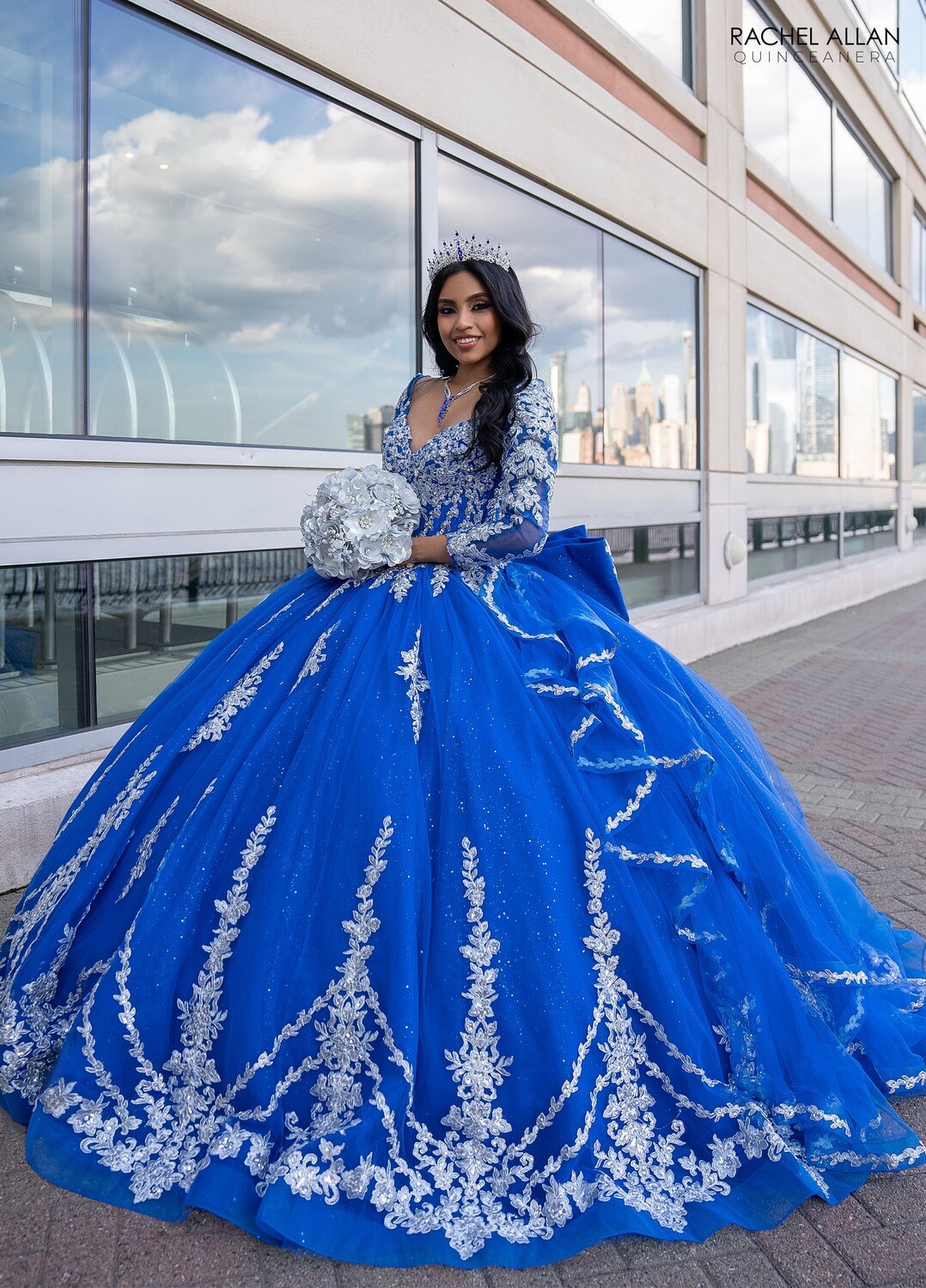 RQ1137 Fabric: 	TULLE, GLITTER TULLE, APPLIQUE, BEADING Available In: 	EMERALD GOLD, ROYAL SILVER