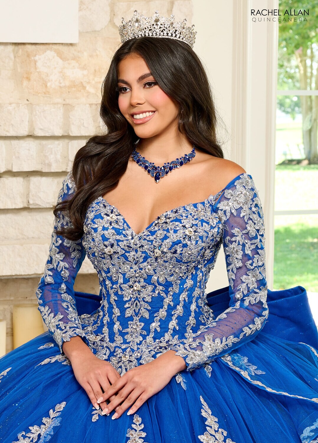 RQ1137 Fabric: 	TULLE, GLITTER TULLE, APPLIQUE, BEADING Available In: 	EMERALD GOLD, ROYAL SILVER