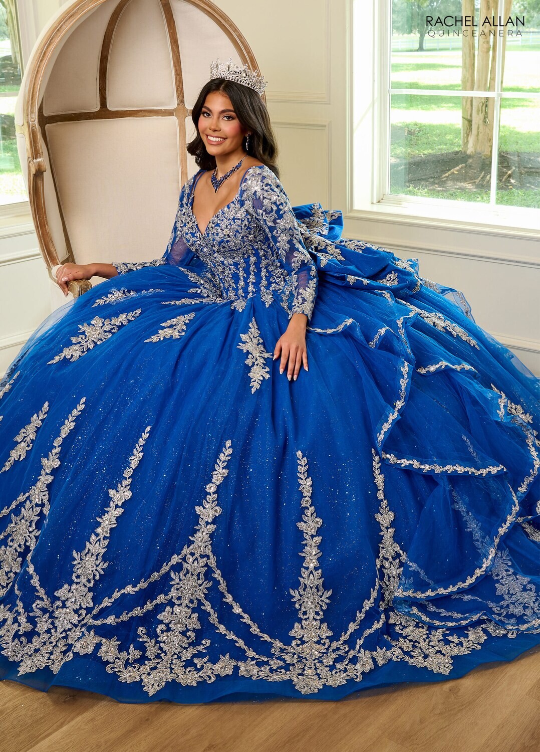 RQ1137 Fabric: 	TULLE, GLITTER TULLE, APPLIQUE, BEADING Available In: 	EMERALD GOLD, ROYAL SILVER