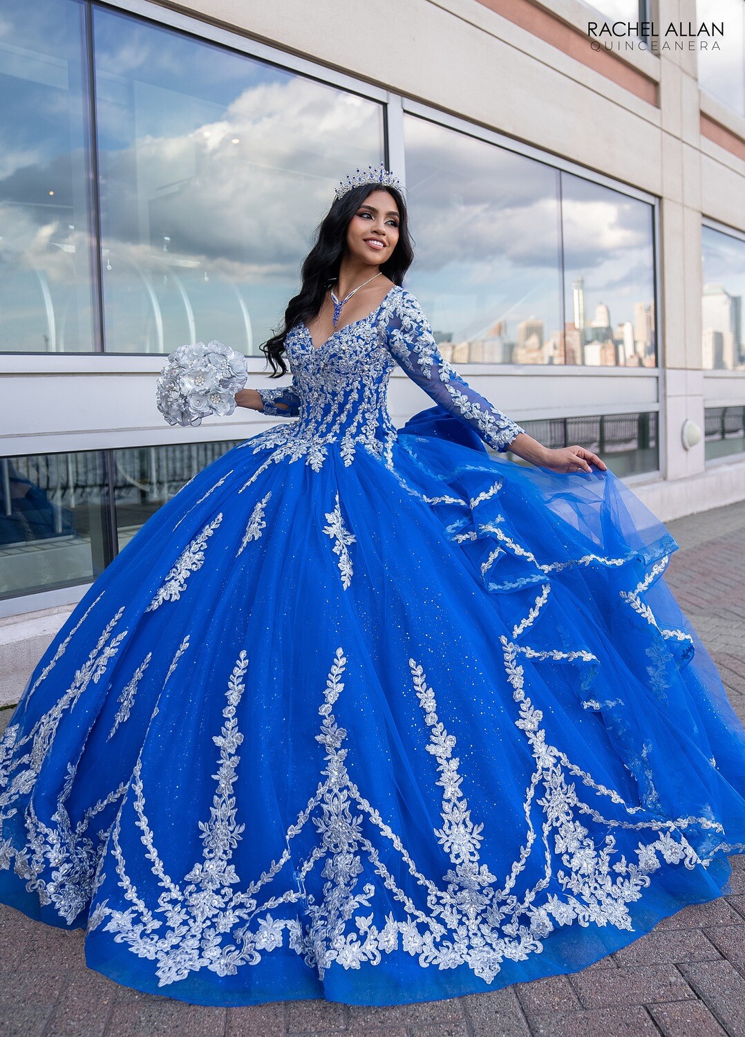 RQ1137 Fabric: 	TULLE, GLITTER TULLE, APPLIQUE, BEADING Available In: 	EMERALD GOLD, ROYAL SILVER