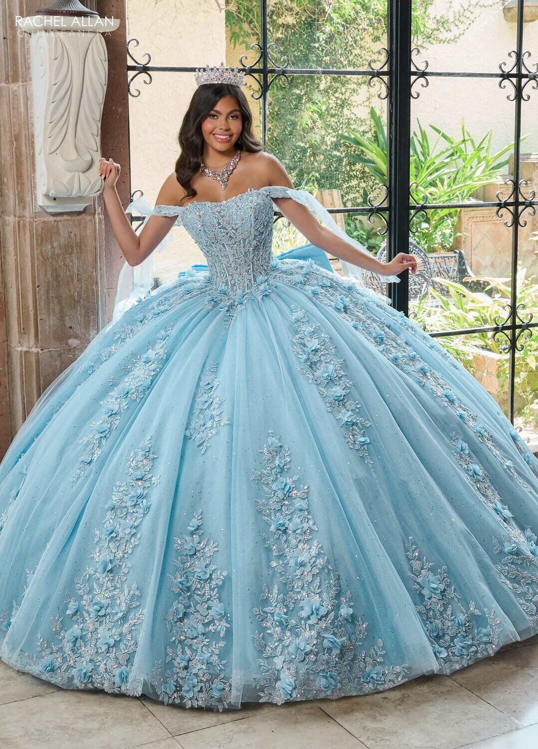 RQ1132 Available In: BLUSH, SAGE LILAC, SKY BLUE Fabric: TULLE, GLITTER TULLE, APPLIQUE, BEADING, 3D FLOWERS