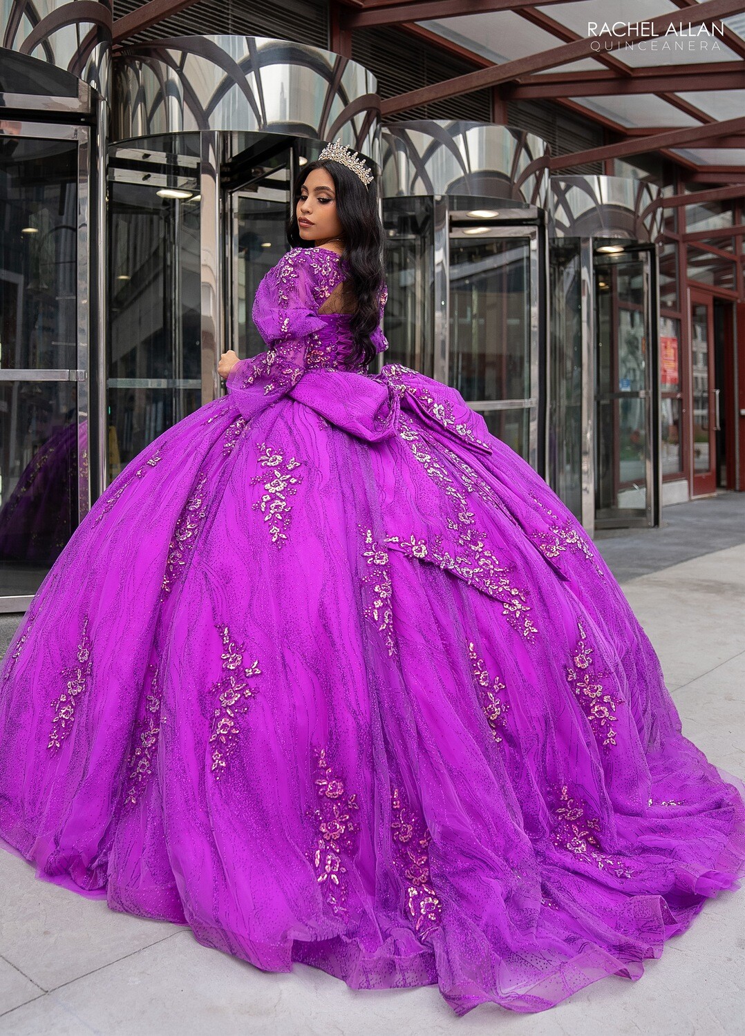 RQ1135 Fabric: 	TULLE, GLITTER TULLE, APPLIQUE, BEADING Available In: 	BRIGHT PINK, PURPLE, RED