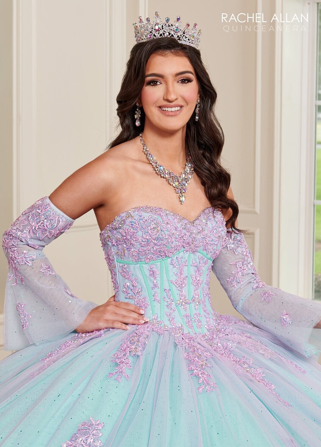 RQ1120 Fabric: TULLE, GLITTER TULLE, APPLIQUE,BEADING Available In: 	BLUSH CHAMPAGNE, LILAC AQUA
