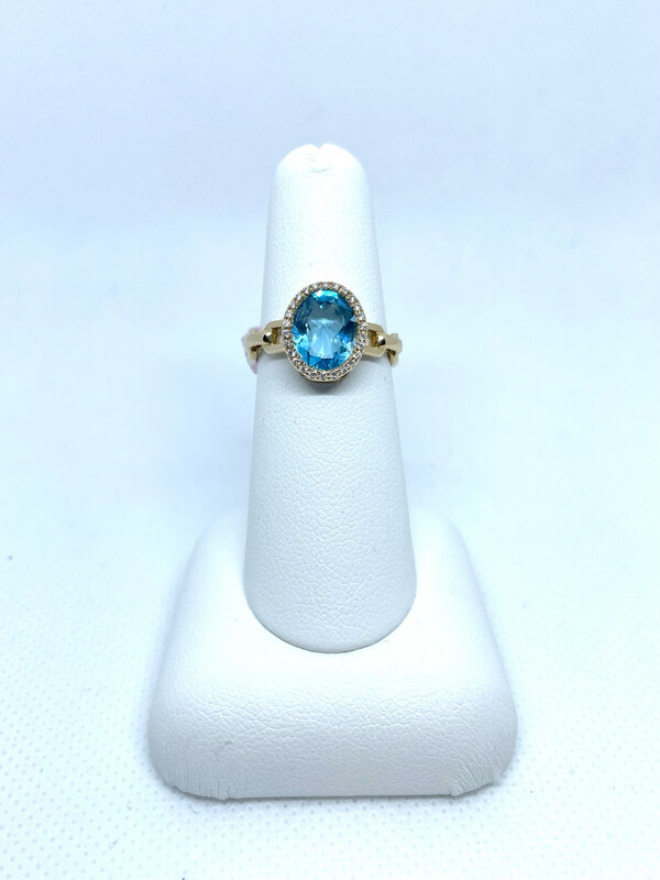 14k Y Blue Topaz Ring