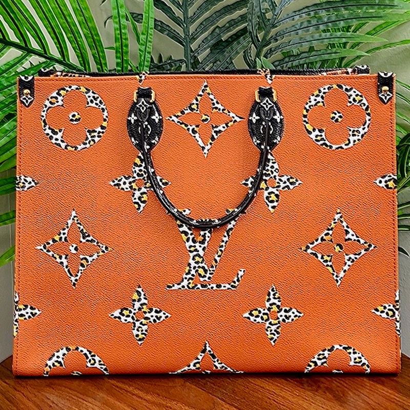 Authentic Louis Vuitton Monogram Giant Jungle Onthego GM (LIKE NEW)