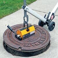 Manhole cover dolly, Aluminum with 12" All Terain wheels (36#)