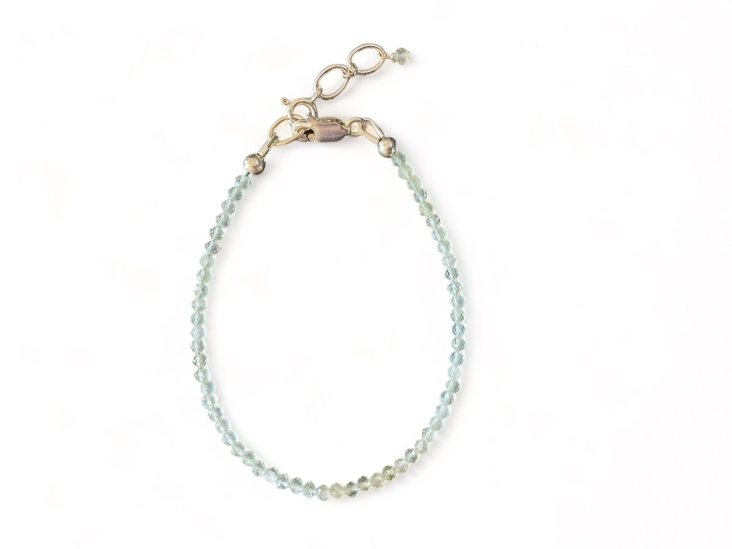 Close-up photo of a Prehnite Micro Faceted Bracelet with dazzling translucent green beads. This stunning bracelet is known for supporting spiritual insight, emotional balance, and healing benefits.