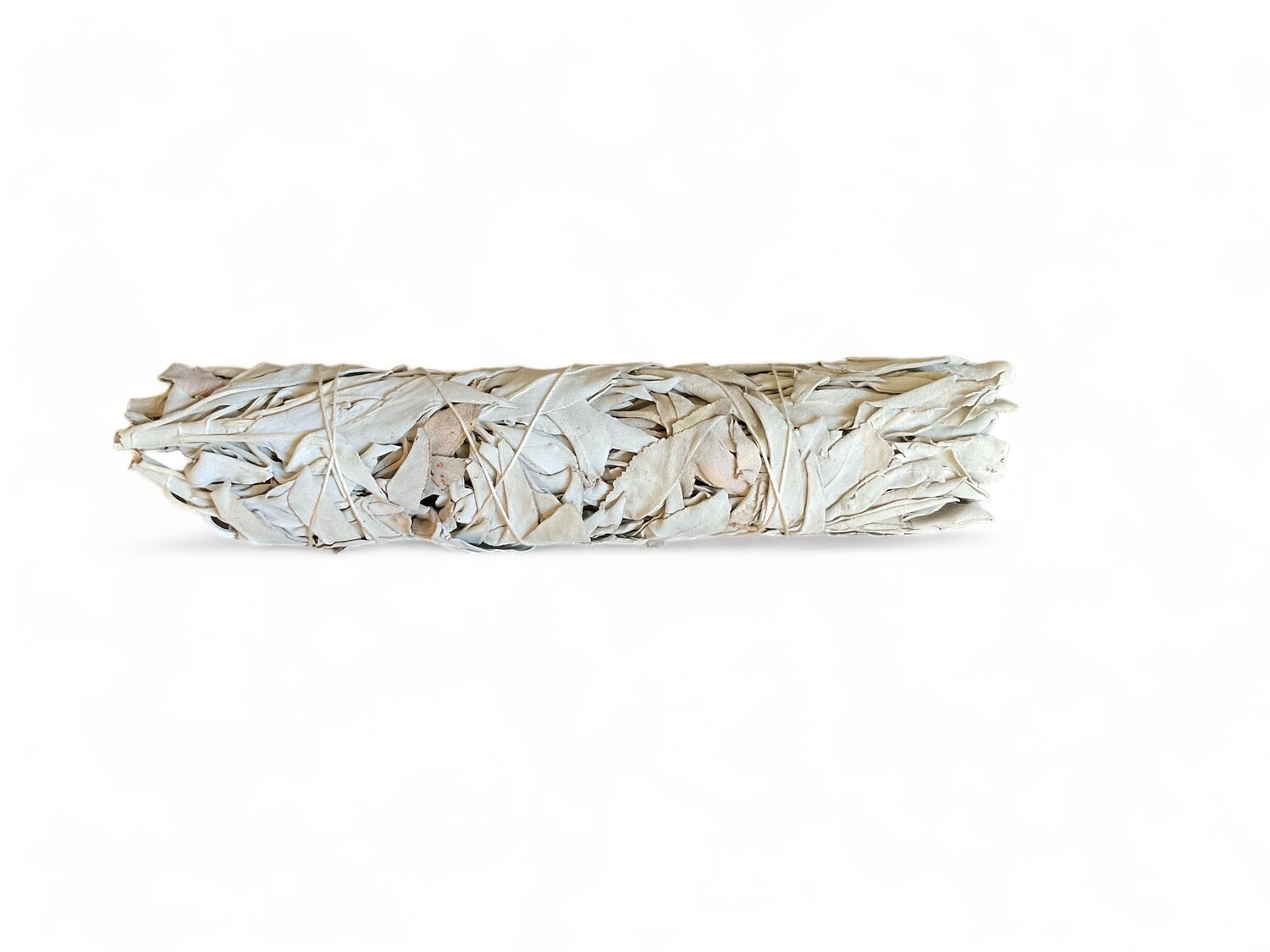 Image of a large, premium white sage bundle. The bundle is tightly wrapped with twine and features a generous amount of sage, showcasing its fullness. Designed for energy purification and cleansing, this bundle is ideal for spiritual and healing practices.