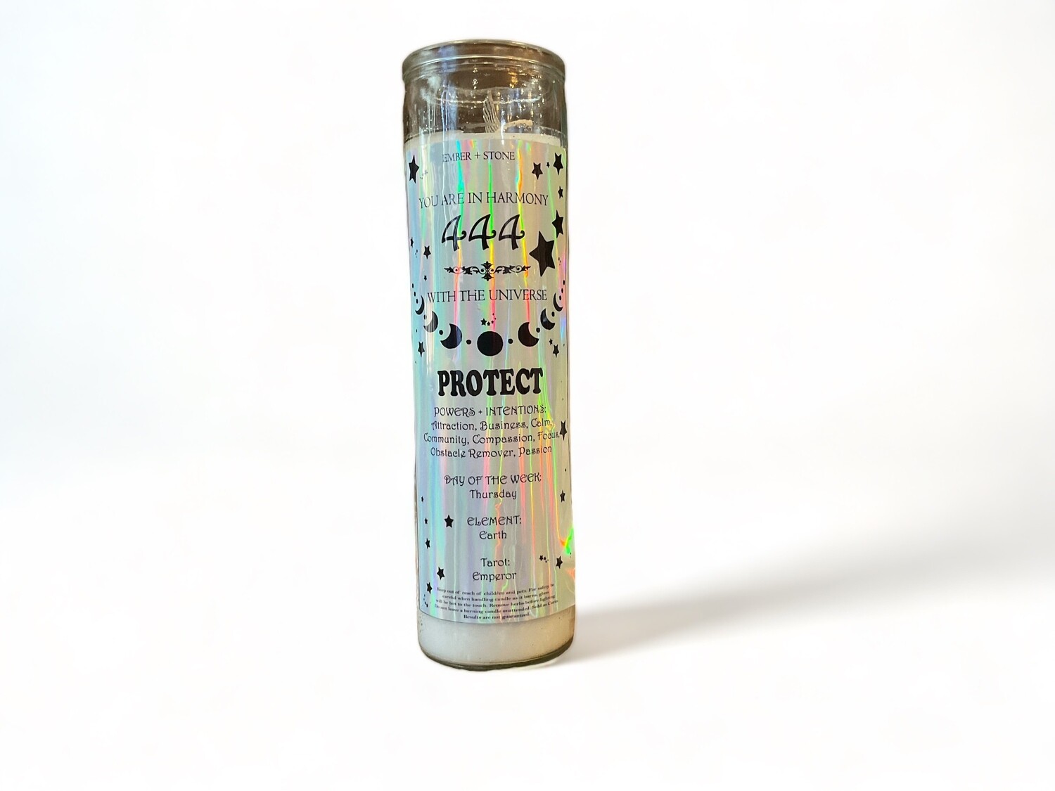 Image of a glass jar candle labeled &#39;Angel Number 444&#39;, glowing warmly. This intention candle is designed to provide protection and promote a peaceful, secure atmosphere in your space.