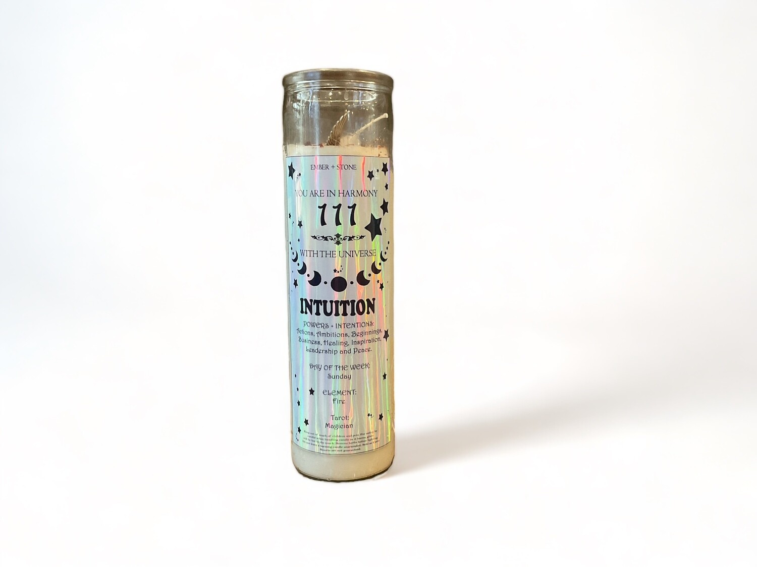 Photograph of a glass jar candle labeled &#39;Angel Number 111&#39;. The candle emits a warm glow, symbolizing intuition and clarity label emphasizes enhancing insight and purpose along one&#39;s path.
