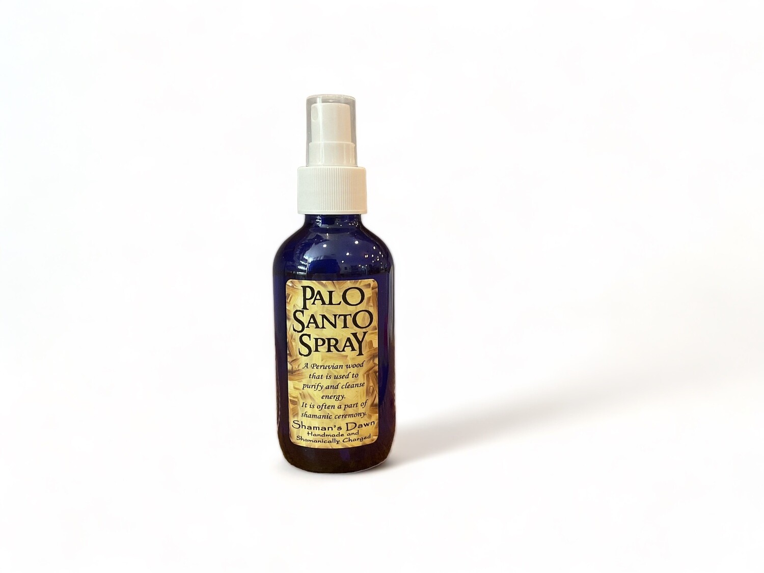Image of a four fluid ounce bottle of Palo Santo Spray. The  bottle features a label with &#39;Palo Santo Spray&#39;.The label highlights that the spray is used for purifying and cleansing energy, commonly employed in shamanic ceremonies for spiritual purification. The design reflects its use as a mystical intention spray, with emphasis on its role in energy cleansing.