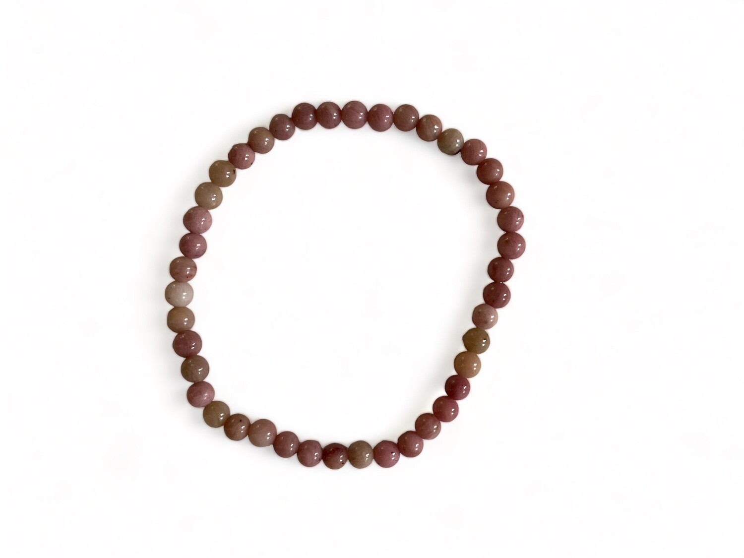 Photo of the Rhodonite Power Minis Bracelet with smooth, dark pink and red beads This stylish bracelet is designed for healing, self-confidence, and balance.