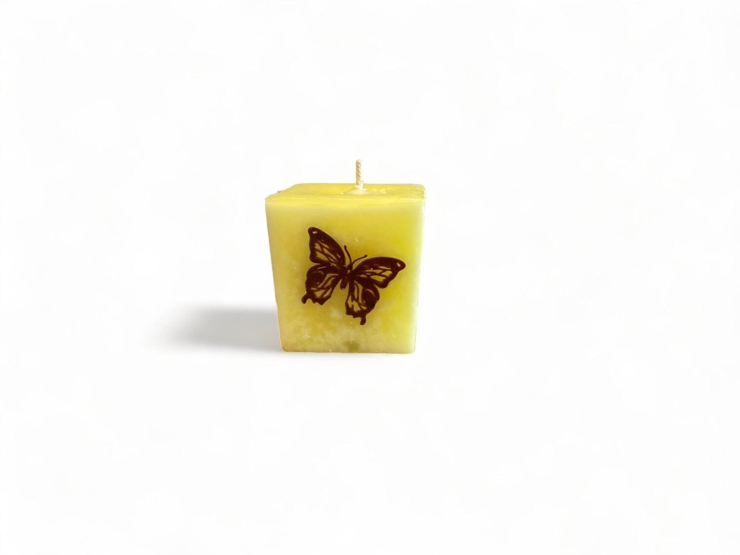 Image of the Aroma Spiritual Cube Candle featuring Patchouli &amp; Orange fragrance, evoking transformation. Crafted from food-grade ingredients and vegetable waxes, with a lead-free wick and 20-hour burn time.
