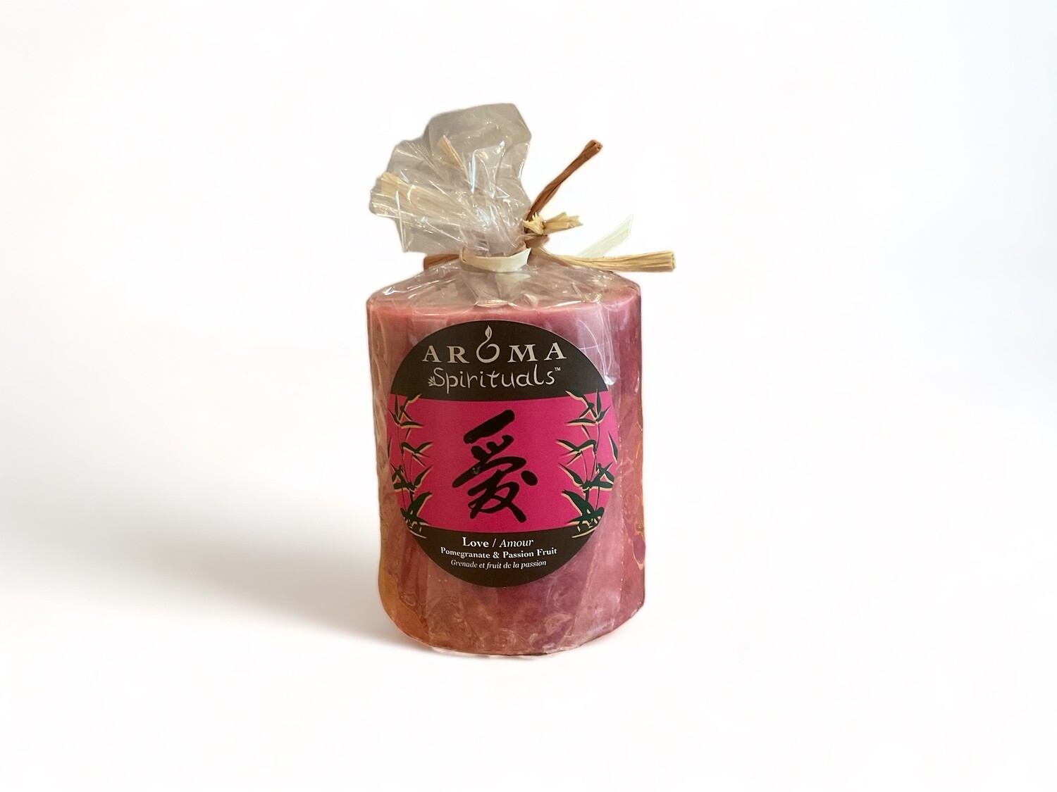 Image of the Aroma Spirituals 3x3.5 Candle evoking love with its Pomegranate &amp; Passion Fruit fragrance. Made from food-grade ingredients and vegetable waxes, featuring a lead-free wick and offering a generous burn time of 60 hours.
