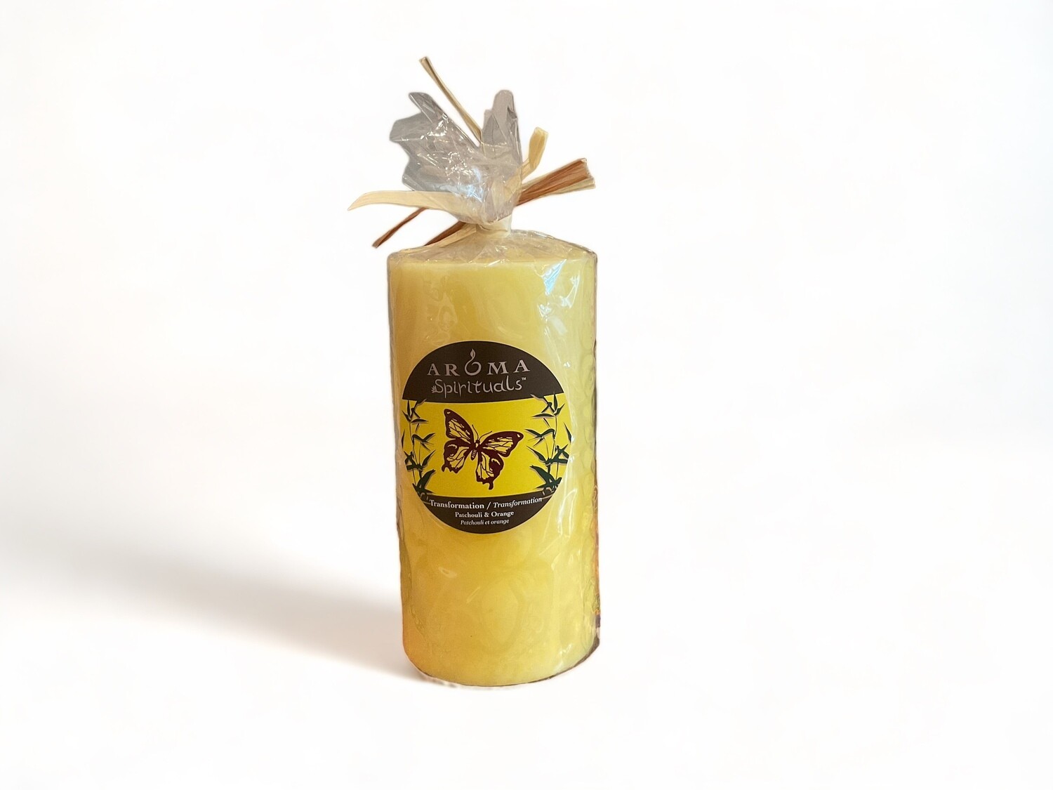 Image of the 3x6 Transformation Candle infused with Patchouli &amp; Orange, creating an atmosphere of transformation and warmth. Crafted from food-grade ingredients and vegetable waxes, featuring a lead-free wick and offering up to 100 hours of burn time.