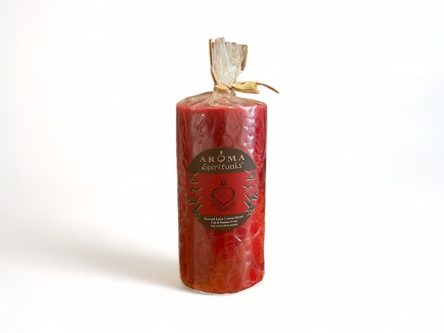 Image of the Eternal Love Candle from Aroma Spirituals 3x6, infused with Fuji &amp; Passion Fruit fragrance for a romantic ambiance. Crafted from food-grade ingredients and vegetable waxes, featuring a lead-free wick and offering up to 100 hours of burn time.