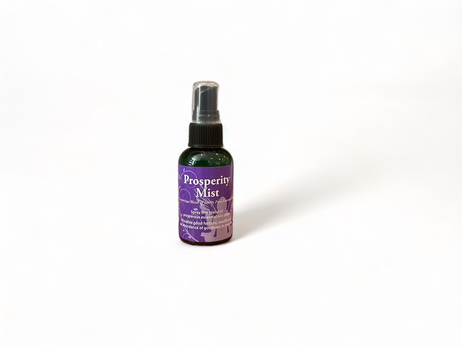 Image of a two ounce bottle of Prosperity Mist Spray. The bottle features a label with &#39;Prosperity Mist&#39;. The label highlights its purpose to invoke and anchor the energy of abundance and visualize good fortune. It is crafted with medical-grade essential oils and sacred site waters. The design emphasizes its use in ritual practices for prosperity and abundance.