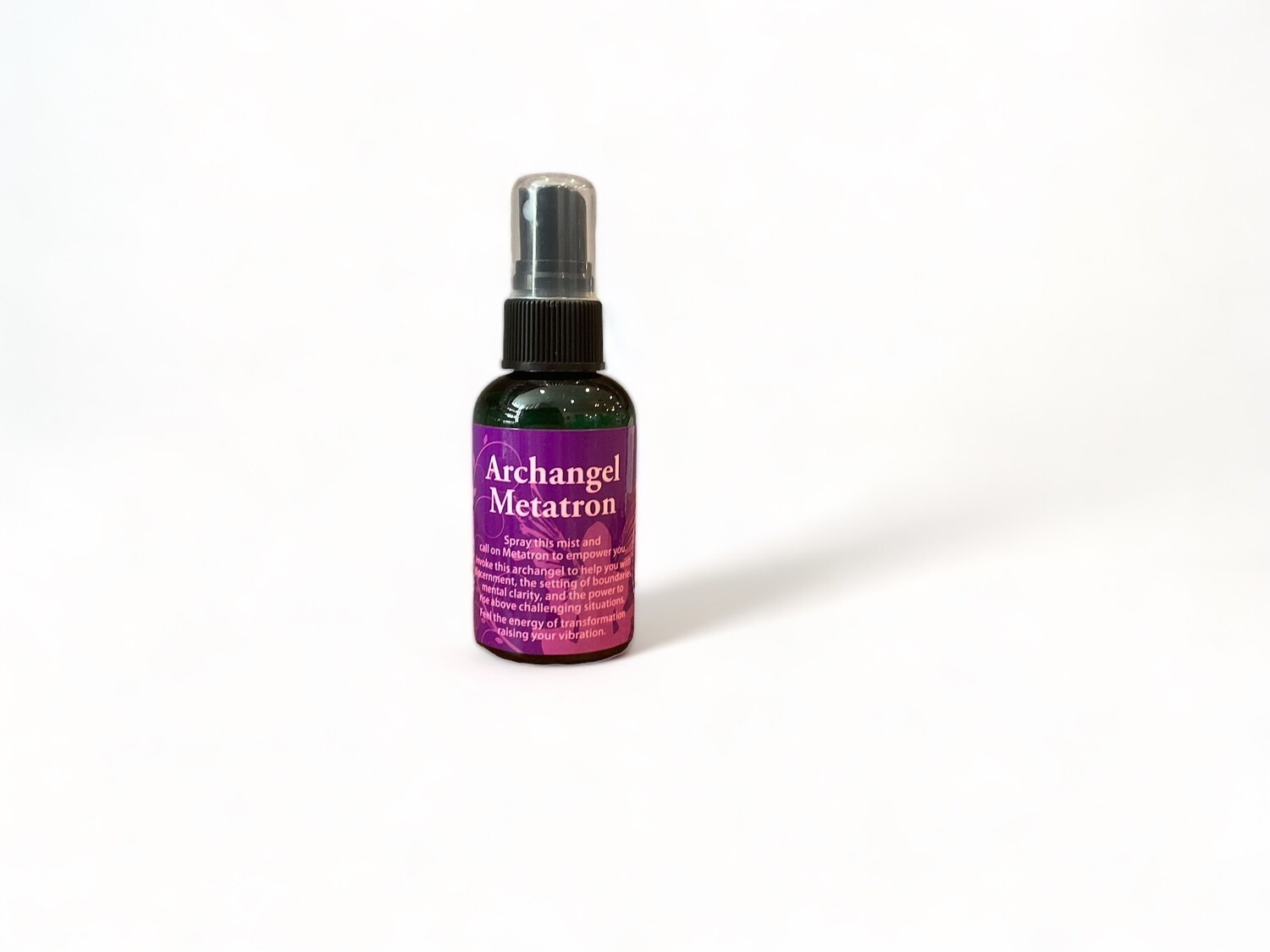 Image of a two ounce bottle of Archangel Metatron Spray. The spray is designed to aid in empowerment, discernment, and mental clarity, providing transformative support.