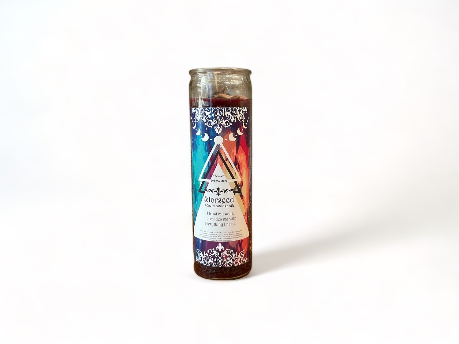 Image of an elegant glass jar containing the Starseed Intention Candle from our mystical shop. Ideal for connecting with your cosmic self and enhancing spiritual exploration.