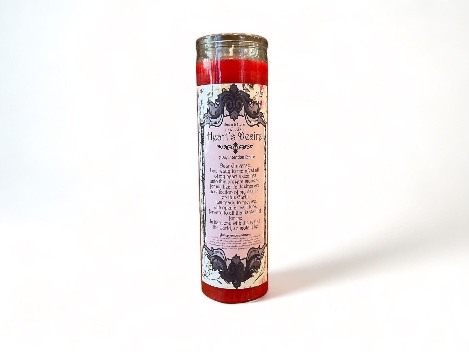 Image of a sleek skinny glass jar containing the Hearts Desire Intention Candle from our spiritual shop. Ideal for setting intentions, igniting passion, and enhancing focus.