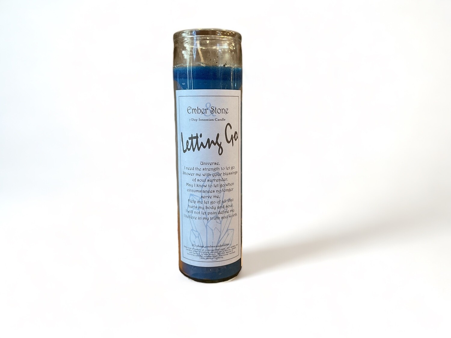 Image of a sleek skinny glass jar containing the Letting Go Intention Candle from our New Age shop in Los Angeles. Ideal for embracing release, renewal, and new beginnings.