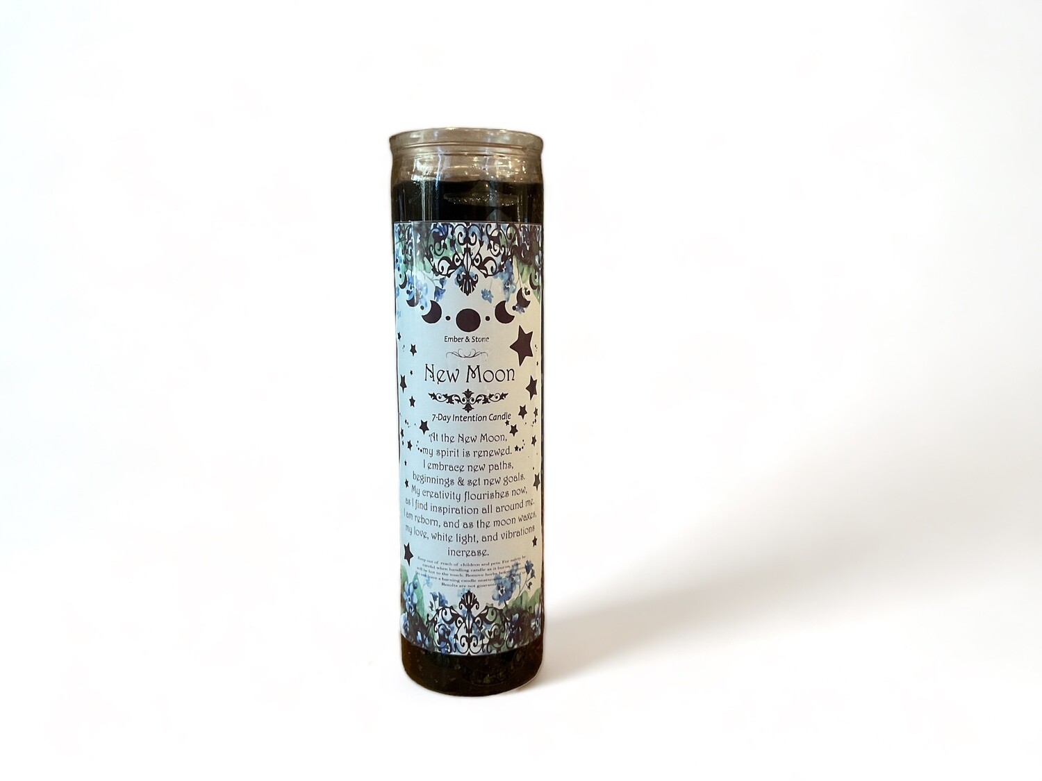 A glass jar holding the New Moon Intention Candle, labeled &#39;New Moon Intention Candle in Glass Jar | Spiritual Candles&#39;. The candle is designed for spiritual rituals, promoting new beginnings and positivity with its intentional design.