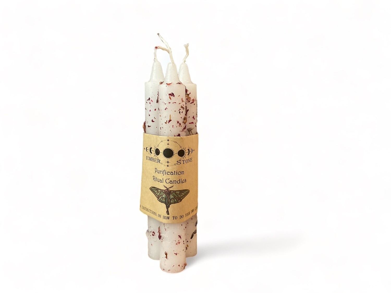 Photo of three taper candles in a bundle for purification rituals. Ideal for cleansing your space and enhancing your revitalization practices. Comes with instruction guide.