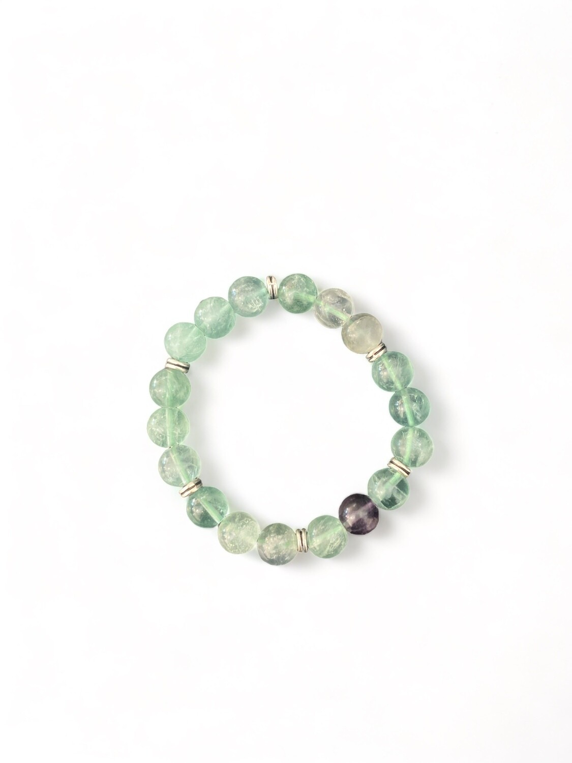 Image of a 10mm Rainbow Fluorite crystal beaded bracelet. This vibrant bracelet supports emotional balance and spiritual growth.