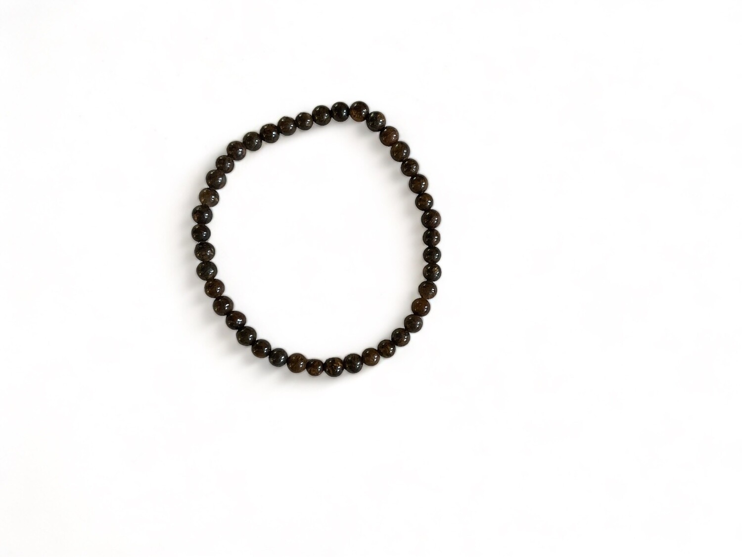 Image of the Bronzite Power Minis Bracelet with shimmering bronze-brown beads. This beautiful gemstone bracelet is designed for protection, confidence, and grounding.