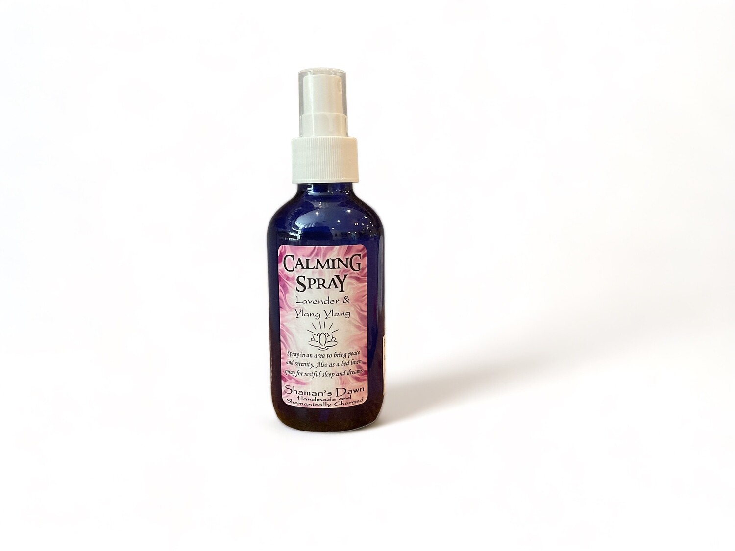Photo of a Calming Spray bottle. The mist bottle is designed to evoke tranquility and well-being. Made with essential oils of Lavender &amp; Ylang Ylang.