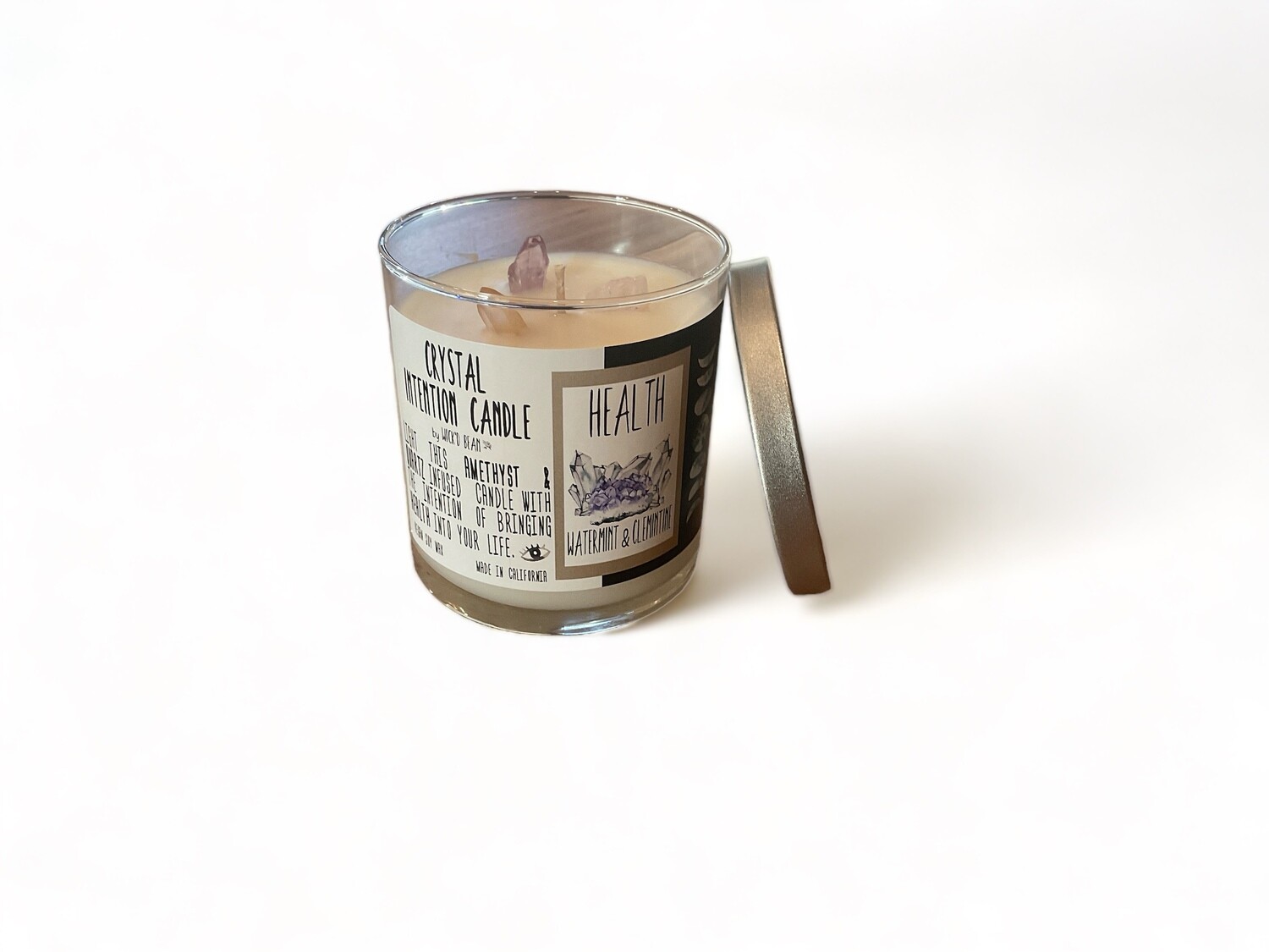 Image of Health Intention Candle with Amethyst &amp; Quartz, featuring vegan soy wax infused with Watermint &amp; Clementine, sealed for freshness in an 11 oz. container.