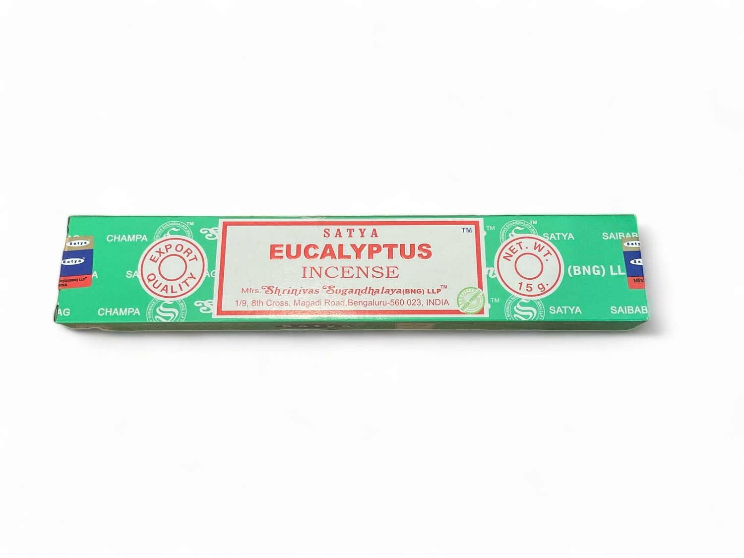 Image of a box of 15 Satya Eucalyptus incense sticks by Shrinivas Sugandhalaya. Each stick is hand-rolled in India and has a slender, uniform shape. The packaging is compact, featuring a label that highlights the use of pure extracts and fine oils. The fragrance is described as fresh and long-lasting. The box includes information about the incense&#39;s high-quality ingredients and its origin, making it suitable for metaphysical practices.