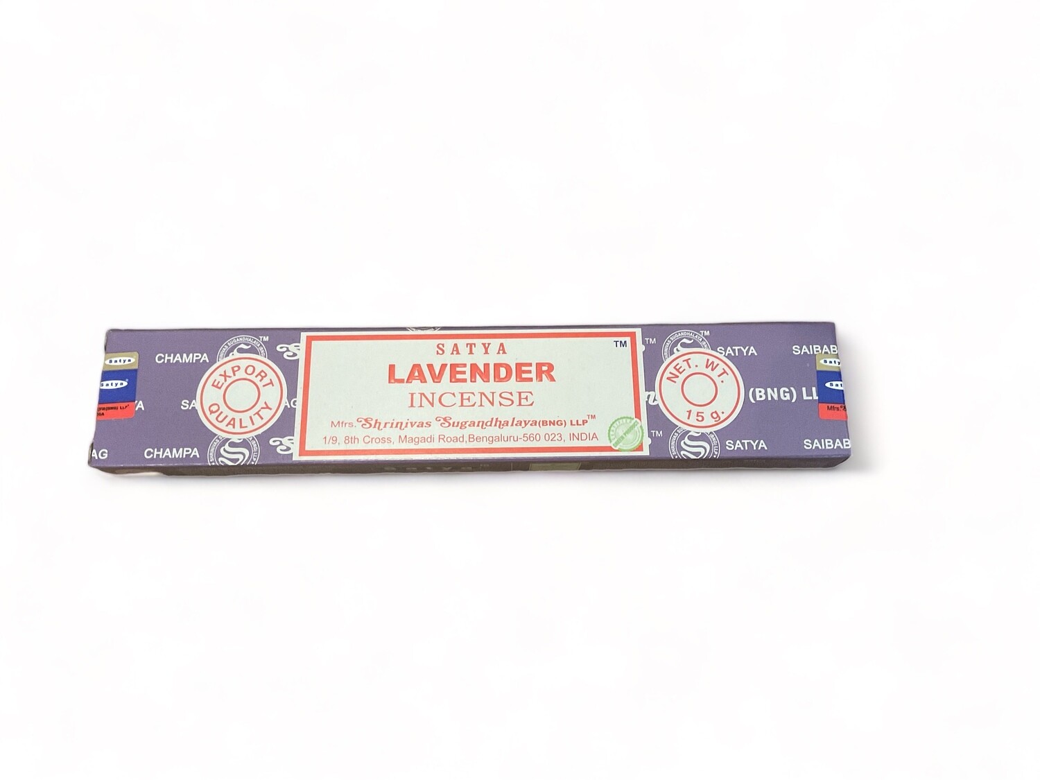 Photograph shows a box of Satya Lavender Incense, featuring 15 hand-rolled incense sticks. The incense is made in India and the incense sticks are made from pure extracts and fine oils, known for their sweet and long-lasting floral lavender fragrance. 
