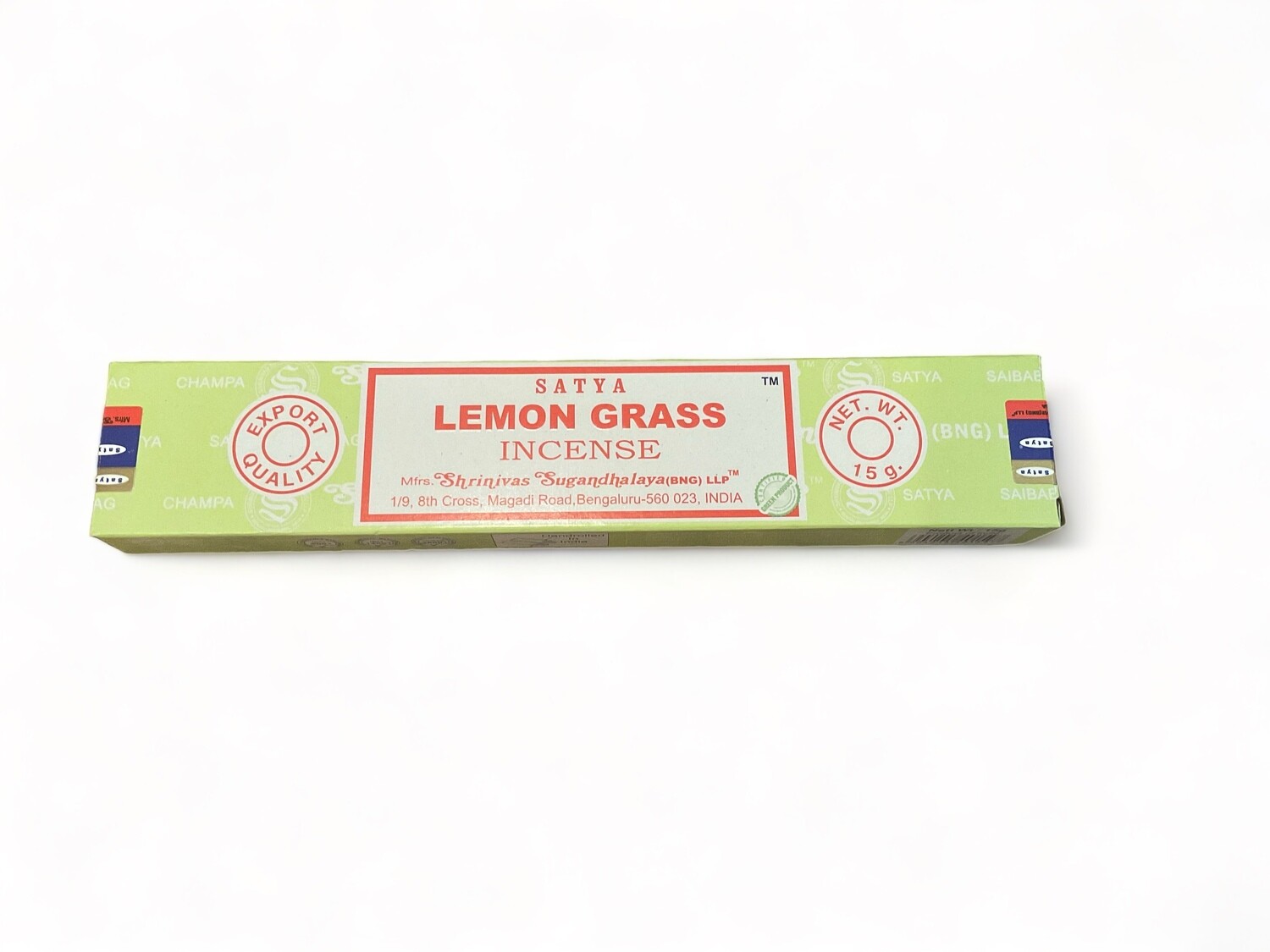 Photo of a box of fifteen Satya Lemongrass Incense sticks, hand-rolled in India. Each stick is crafted with pure extracts and fine oils, offering a refreshing citrus fragrance. The box features a vibrant design and contains a total of fifteen sticks, ideal for long-lasting use. This incense provides a clean, invigorating scent perfect for enhancing the ambiance of any space.