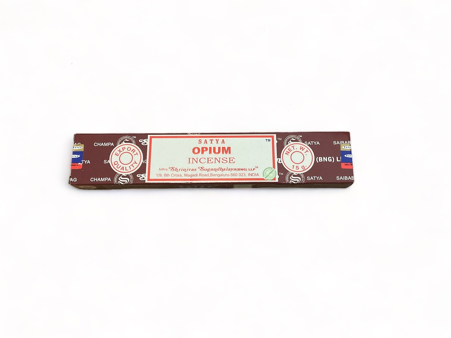 Image of a box of Satya Opium Incense sticks featuring fifteen hand-rolled sticks. The packaging emphasizes the incense&#39;s high quality, crafted in India with pure extracts. Each stick is designed for a long burn time, offering a sweet and earthy aroma. The box is ideal for gifts and relaxation, with a design highlighting the premium nature of the incense. 