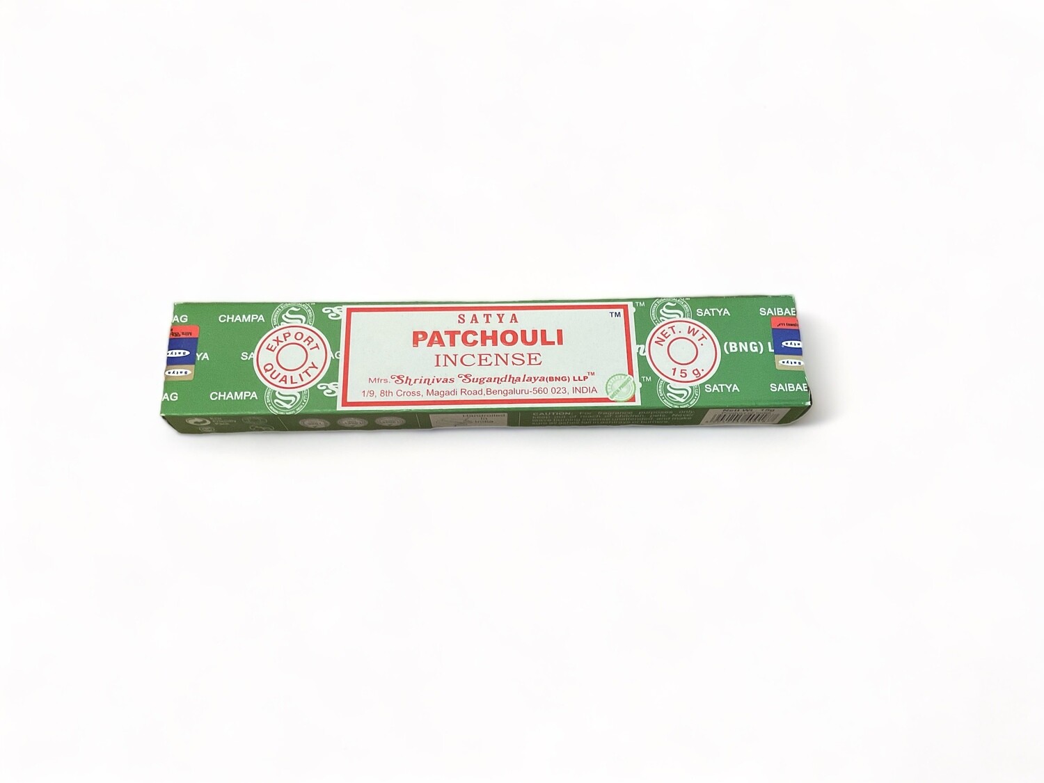 Photo of a box containing 15 Satya Patchouli incense sticks. The packaging highlights the incense&#39;s high quality and hand-rolled craftsmanship by Shrinivas Sugandhalaya in India. The sticks are made from natural extracts, designed to provide a sweet, long-lasting earthy scent. 