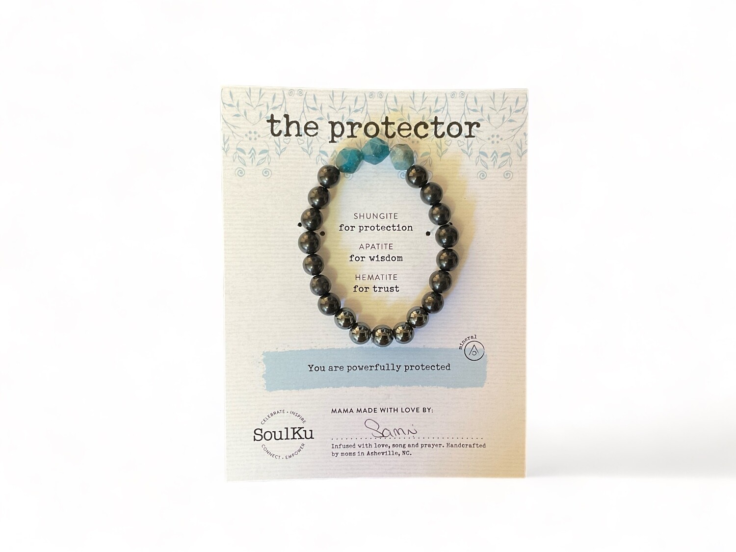 Photo of the Women&#39;s Protector Bracelet featuring 8mm black Shungite beads, faceted blue Apatite, and Hematite. Shungite neutralizes EMFs, Apatite aids focus, and Hematite provides grounding.