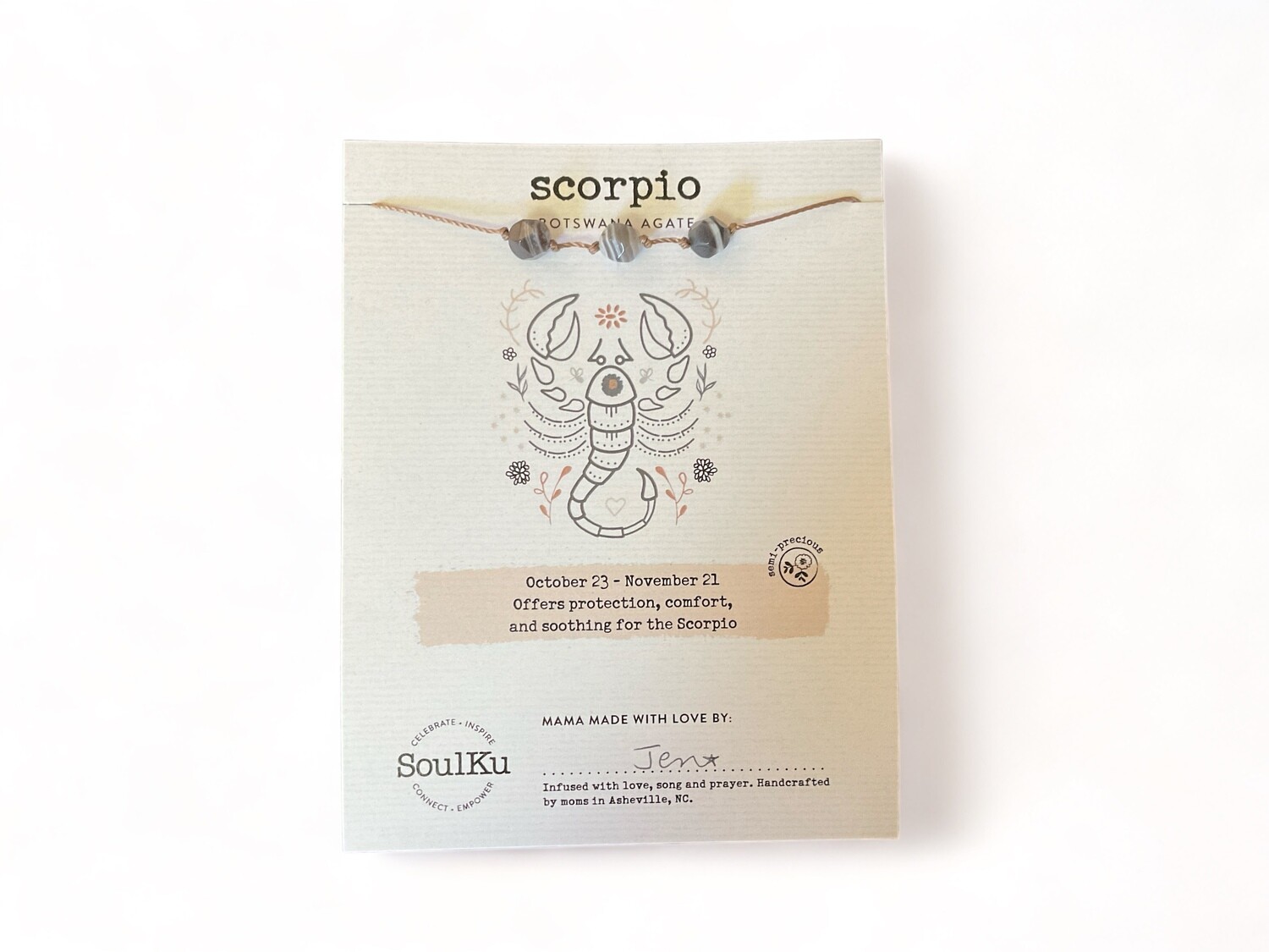 Image of a Scorpio Zodiac necklace featuring Botswana agate, with multi-colored crystal beads displaying gray, pink, and white bands. This necklace is designed to provide protection, comfort, and soothing energy, tailored to enhance emotional balance for Scorpios.