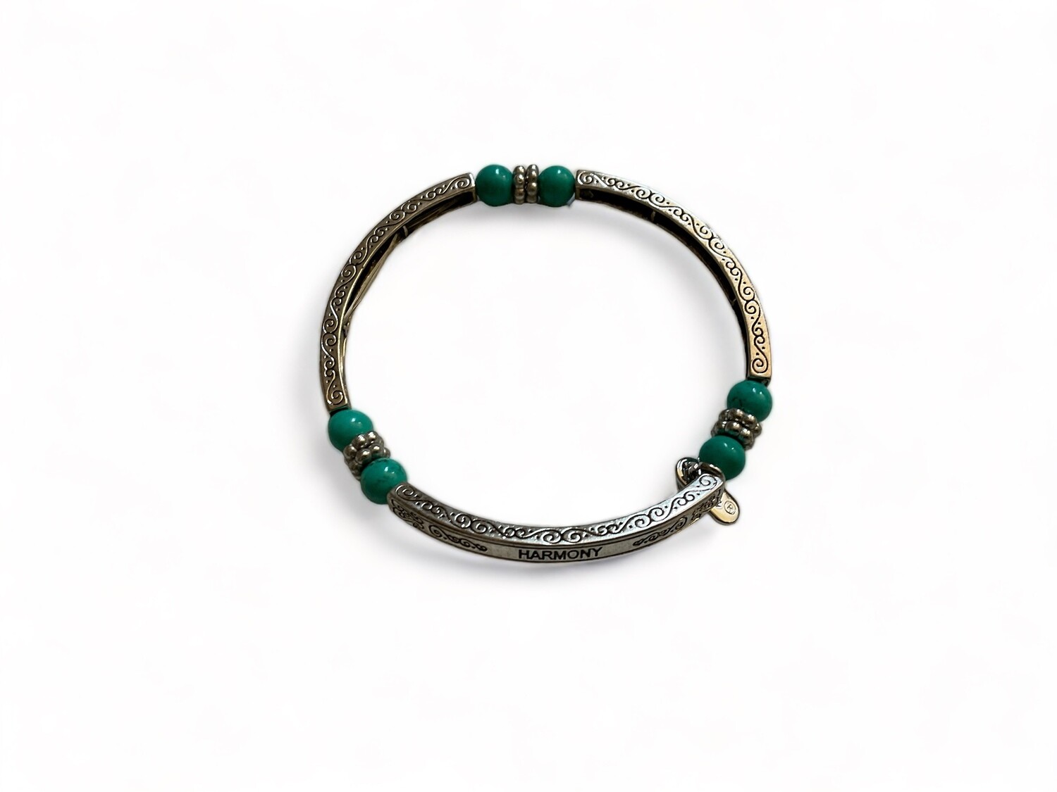 Image of a beautiful Turquoise bangle bracelet featuring vibrant blue-green stones, designed to elevate energy and style. Ideal for enhancing healing and promoting serenity.