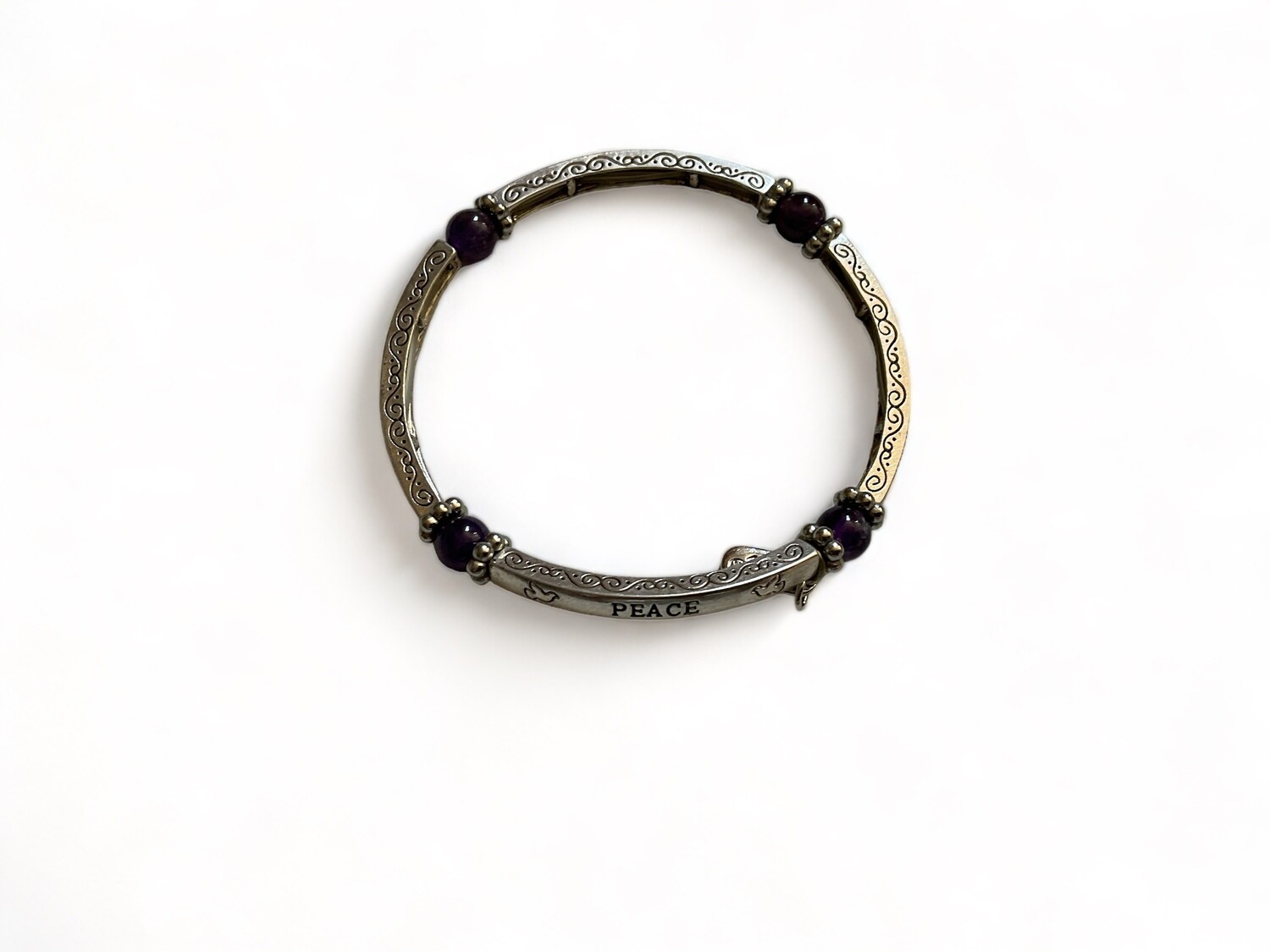 Photo of an Amethyst bangle bracelet with a stylish design, ideal for enhancing intuition and tranquility. Perfect for spiritual growth and emotional balance, and makes for a thoughtful gift.