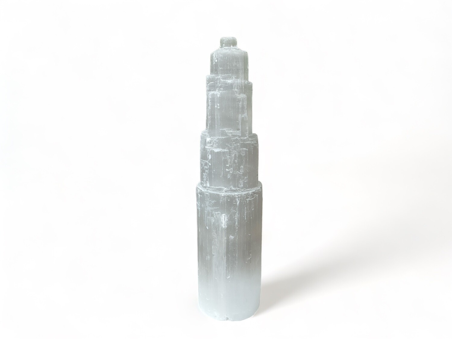 Photo of a Selenite 14&quot; Tower Lamp with a calming, natural glow, perfect for adding elegance to any space. Ideal for enhancing your metaphysical décor collection.